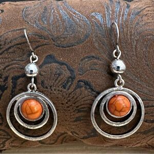 Orbital Silver and Orange Earrings with Concentric Design